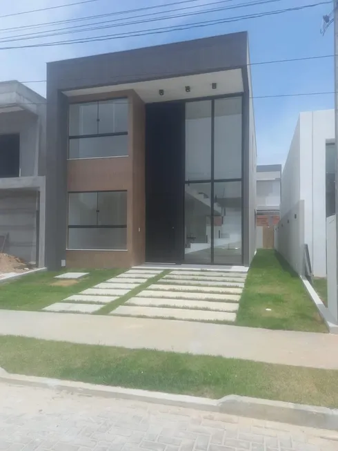 Foto 1 de Casa de Condomínio com 4 Quartos à venda, 161m² em Guarajuba Monte Gordo, Camaçari