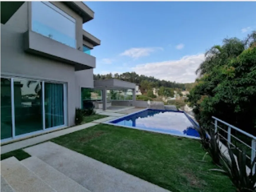 Foto 1 de Casa de Condomínio com 5 Quartos para venda ou aluguel, 729m² em Alphaville, Santana de Parnaíba