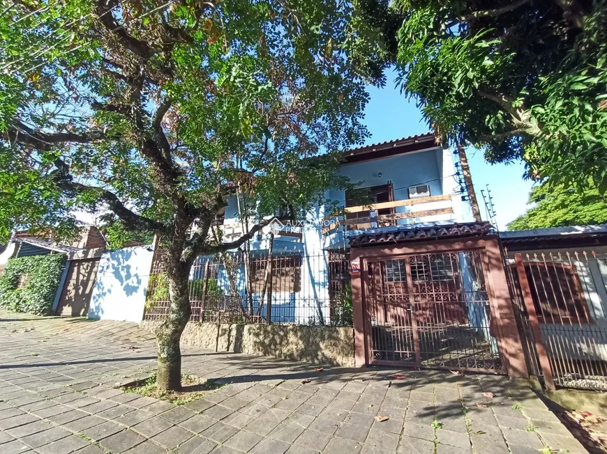 Foto 1 de Casa com 4 Quartos à venda, 419m² em Nonoai, Porto Alegre