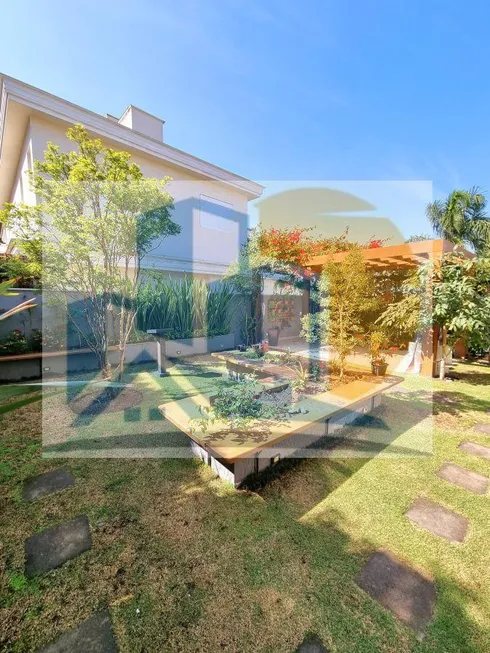 Foto 1 de Casa com 4 Quartos para alugar, 483m² em Aldeia da Serra, Barueri