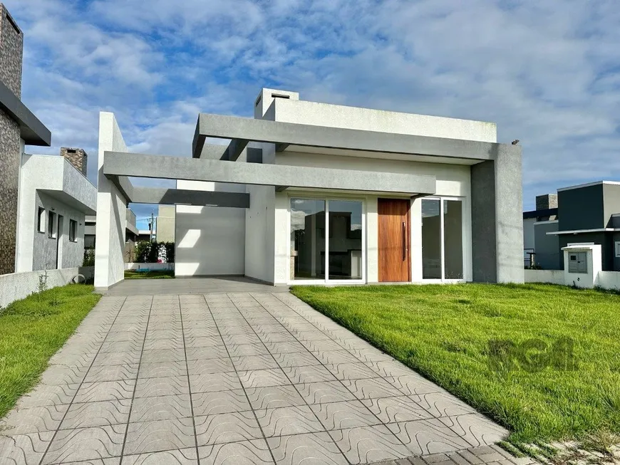 Foto 1 de Casa de Condomínio com 3 Quartos à venda, 159m² em Capao da Canoa, Capão da Canoa
