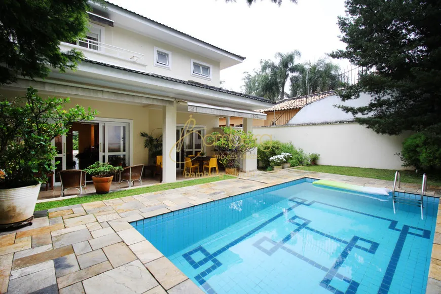 Foto 1 de Casa de Condomínio com 4 Quartos à venda, 438m² em Jardim Guedala, São Paulo