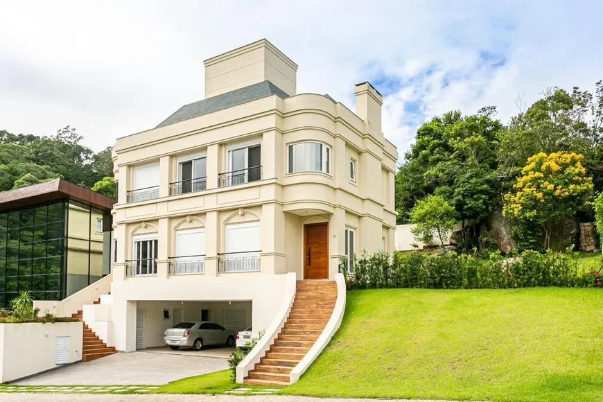 Foto 1 de Casa de Condomínio com 4 Quartos à venda, 319m² em Cacupé, Florianópolis