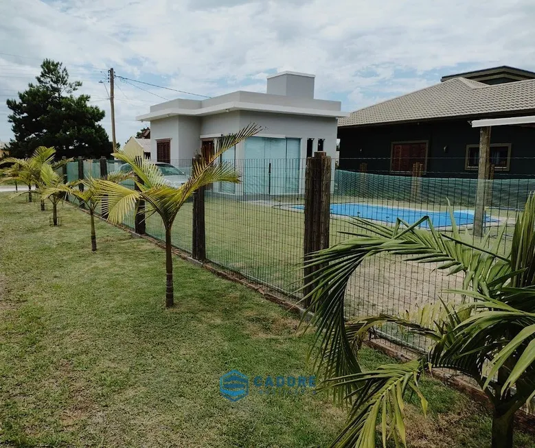 Foto 1 de Casa com 2 Quartos à venda, 67m² em Praia Paraiso, Torres