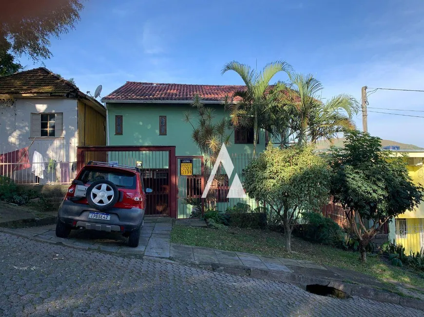 Foto 1 de Casa com 4 Quartos à venda, 217m² em Partenon, Porto Alegre