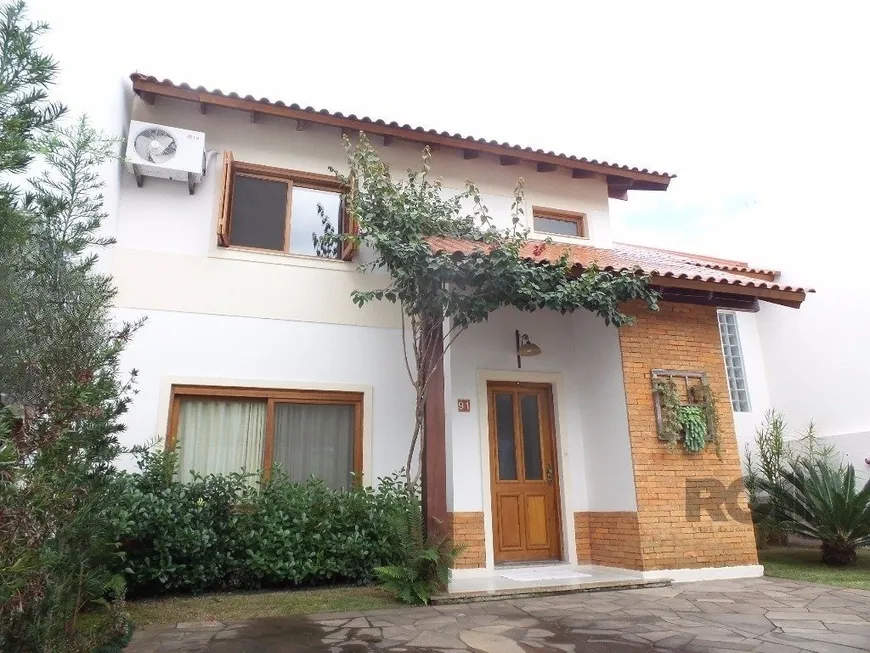 Foto 1 de Casa de Condomínio com 3 Quartos à venda, 198m² em Hípica, Porto Alegre