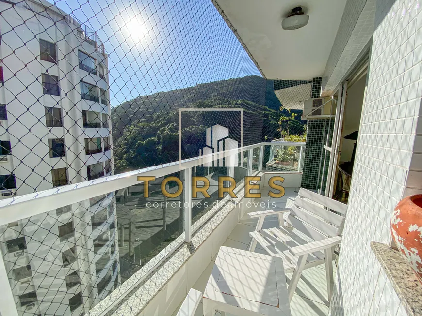 Foto 1 de Apartamento com 3 Quartos à venda, 90m² em Praia das Pitangueiras, Guarujá