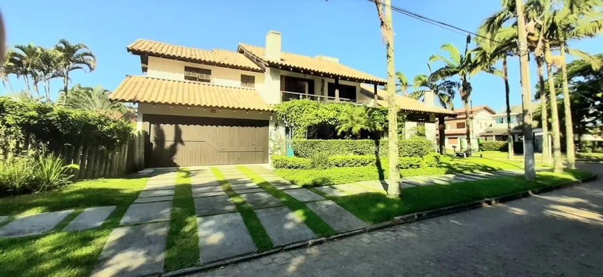 Foto 1 de Casa com 4 Quartos para venda ou aluguel, 400m² em Jurerê Internacional, Florianópolis