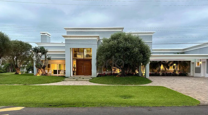 Foto 1 de Casa de Condomínio com 4 Quartos à venda, 681m² em Condominio Atlantida Ilhas Park, Xangri-lá