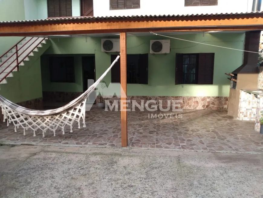 Foto 1 de Casa de Condomínio com 3 Quartos à venda, 80m² em Cristo Redentor, Porto Alegre