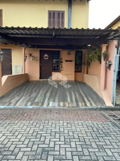 Foto 1 de Sobrado com 2 Quartos à venda, 74m² em Querência, Viamão