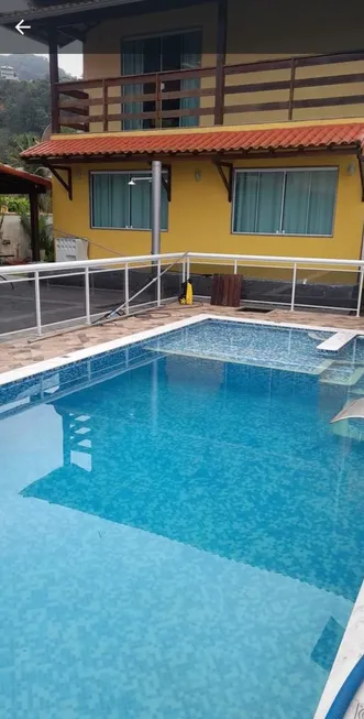 Foto 1 de Casa de Condomínio com 5 Quartos para alugar, 220m² em Garatucaia, Angra dos Reis
