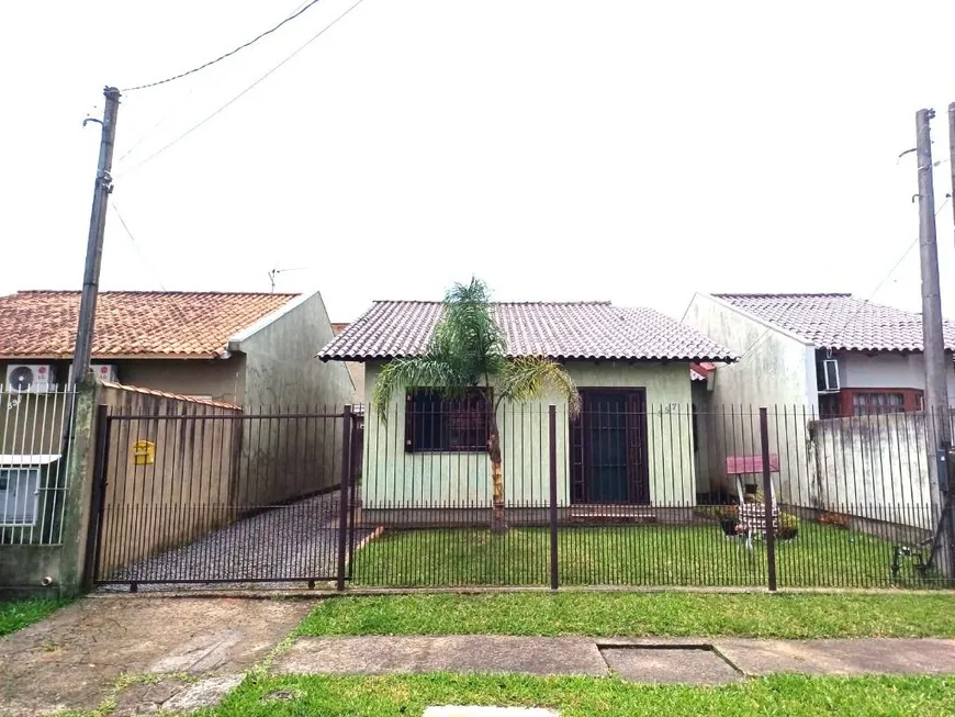 Foto 1 de Casa com 2 Quartos à venda, 69m² em Olaria, Canoas