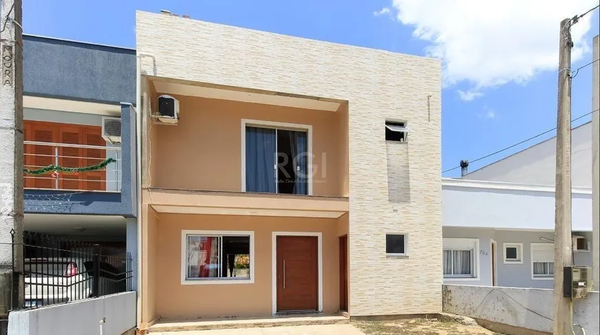 Foto 1 de Casa com 3 Quartos à venda, 209m² em Hípica, Porto Alegre