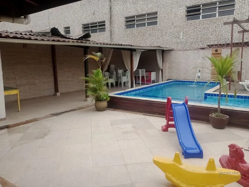 Foto 1 de Casa com 4 Quartos à venda, 217m² em Macuco, Santos