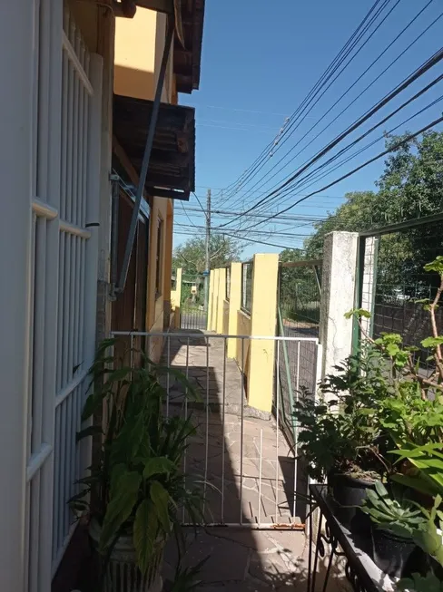 Foto 1 de Sobrado com 2 Quartos à venda, 67m² em Vila Nova, Porto Alegre