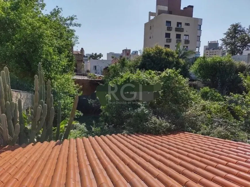 Foto 1 de Casa com 4 Quartos à venda, 182m² em Rio Branco, Porto Alegre