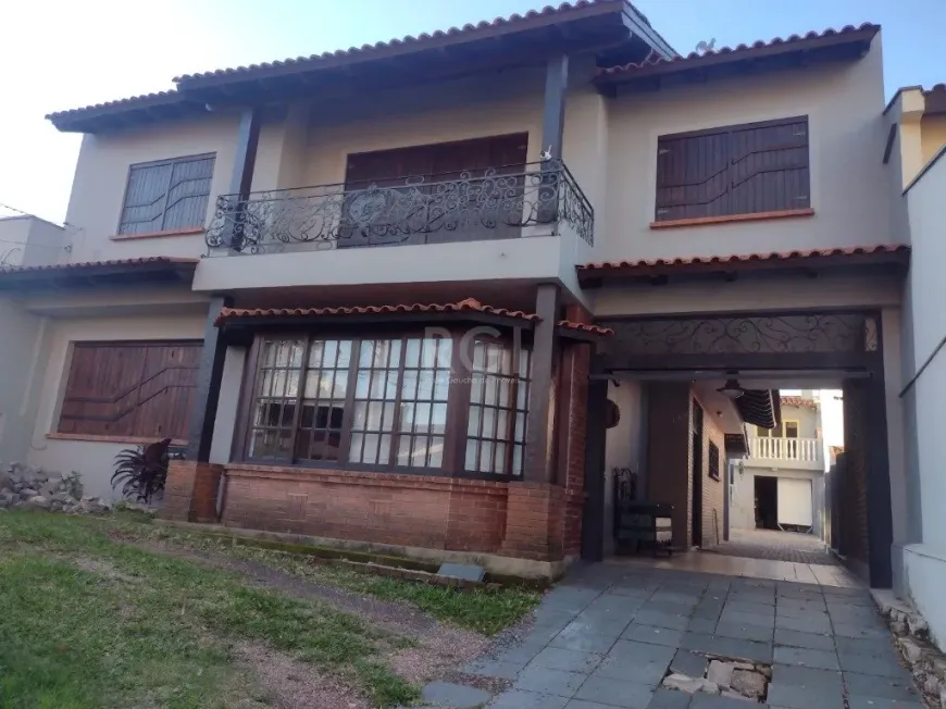 Foto 1 de Casa com 4 Quartos à venda, 389m² em Vila Assunção, Porto Alegre