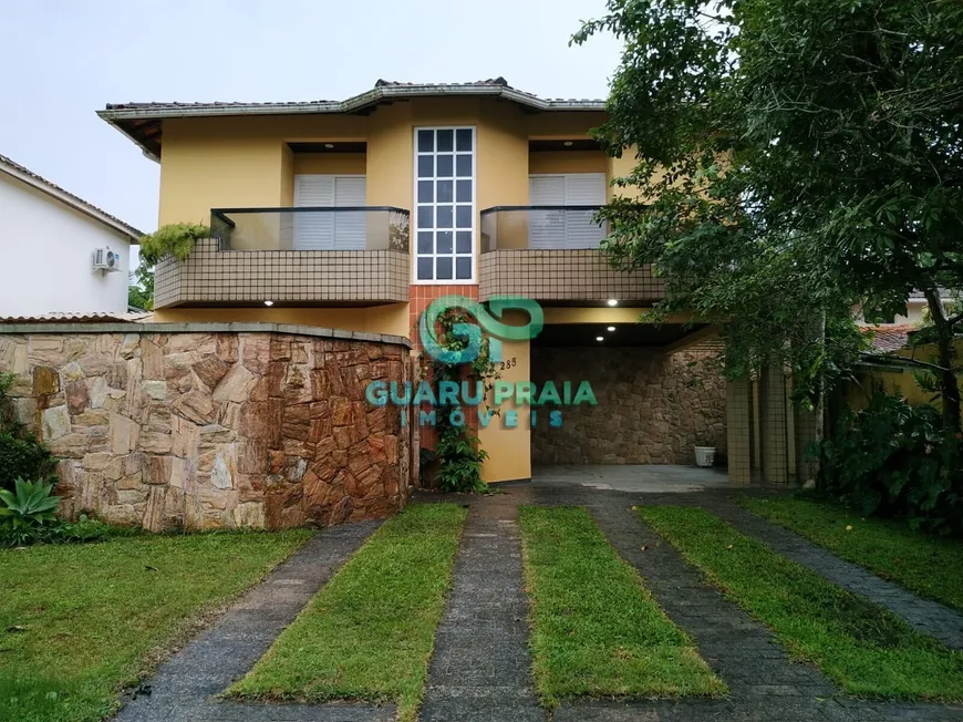 Foto 1 de Casa de Condomínio com 4 Quartos para alugar, 202m² em Balneário Praia do Pernambuco, Guarujá