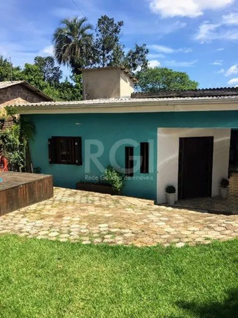 Foto 1 de Casa com 3 Quartos à venda, 143m² em Tarumã, Viamão