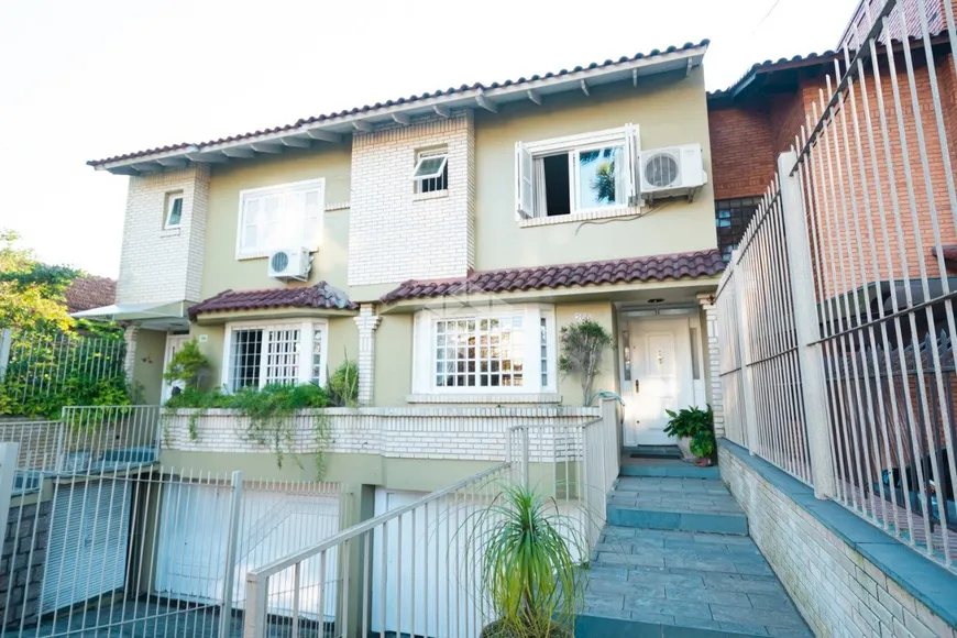 Foto 1 de Casa com 4 Quartos à venda, 344m² em Chácara das Pedras, Porto Alegre