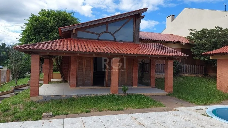 Foto 1 de Casa com 3 Quartos à venda, 301m² em Espiríto Santo, Porto Alegre