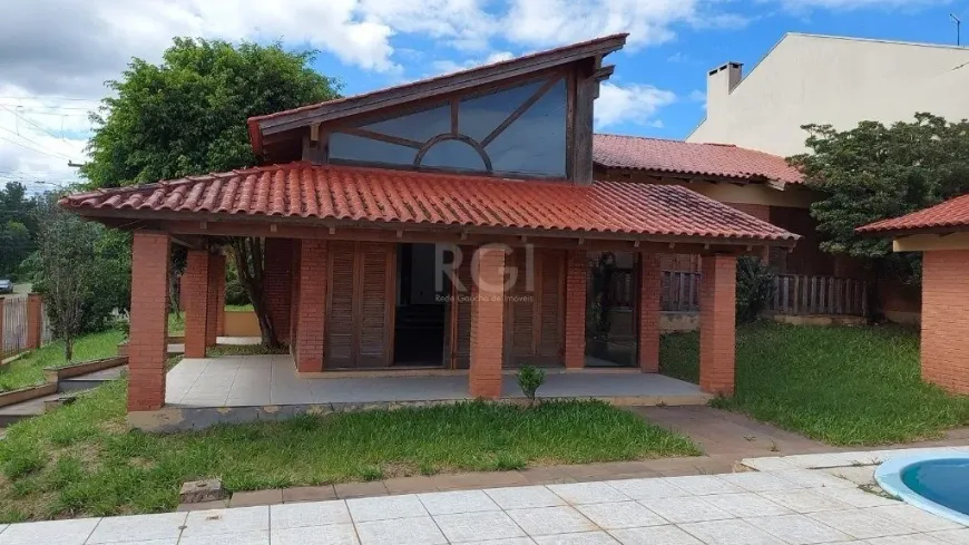 Foto 1 de Casa com 3 Quartos à venda, 303m² em Espiríto Santo, Porto Alegre