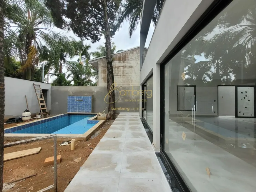 Foto 1 de Casa de Condomínio com 4 Quartos à venda, 400m² em Jardim Petrópolis, São Paulo