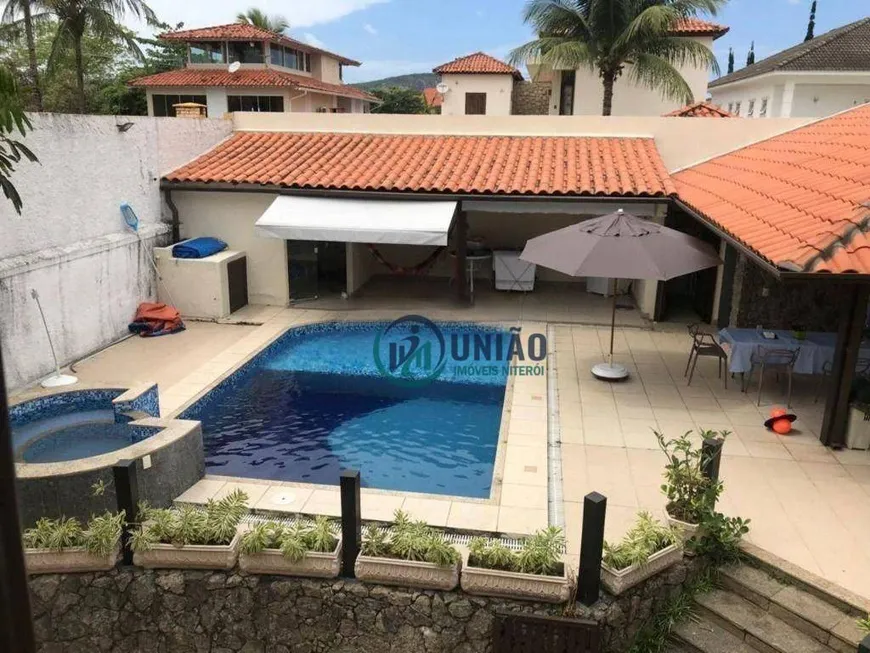 Foto 1 de Casa com 4 Quartos à venda, 361m² em Camboinhas, Niterói