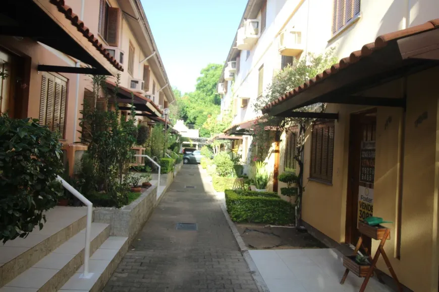 Foto 1 de Casa de Condomínio com 3 Quartos à venda, 85m² em Camaquã, Porto Alegre