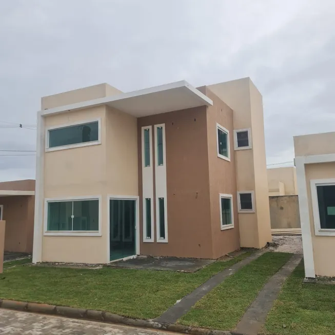 Foto 1 de Casa de Condomínio com 4 Quartos à venda, 130m² em Busca-Vida, Camaçari