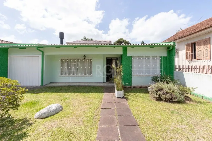 Foto 1 de Casa com 4 Quartos à venda, 182m² em Jardim Isabel, Porto Alegre