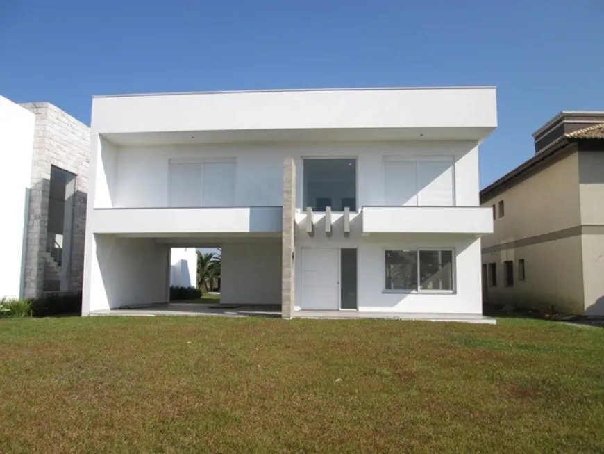 Foto 1 de Casa de Condomínio com 4 Quartos à venda, 120m² em Centro, Imbé