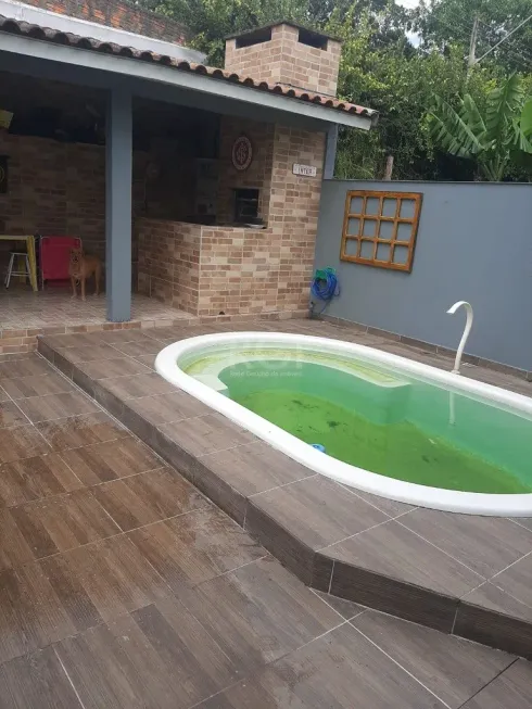 Foto 1 de Casa de Condomínio com 3 Quartos à venda, 200m² em Vila Nova, Porto Alegre