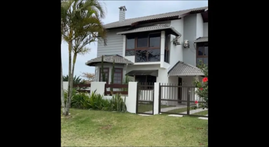 Foto 1 de Casa com 5 Quartos à venda, 291m² em Barra de Ibiraquera, Imbituba