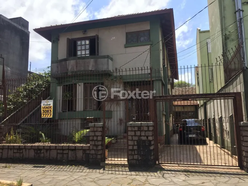 Foto 1 de Casa com 4 Quartos à venda, 308m² em São Geraldo, Porto Alegre