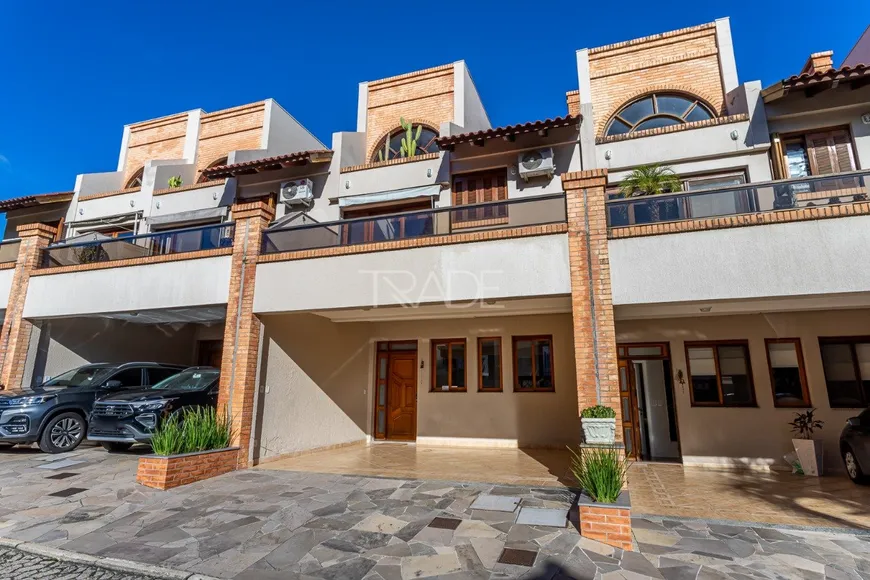 Foto 1 de Casa de Condomínio com 3 Quartos à venda, 207m² em Pedra Redonda, Porto Alegre