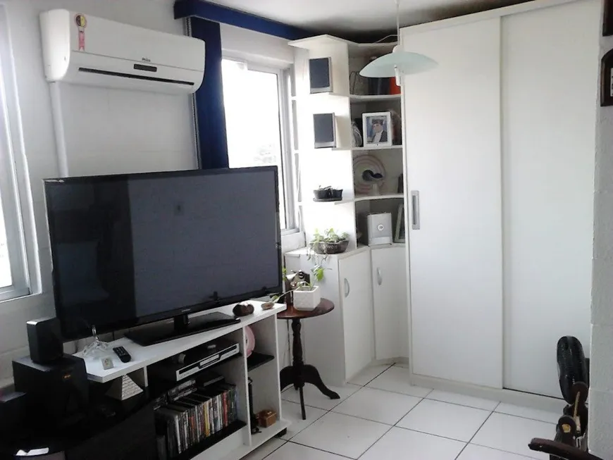 Foto 1 de Apartamento com 2 Quartos à venda, 37m² em Vila Nova, Porto Alegre