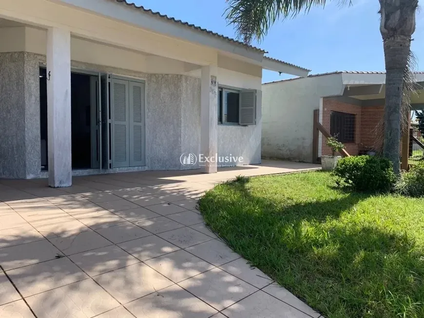 Foto 1 de Casa com 5 Quartos à venda, 138m² em Centro, Xangri-lá