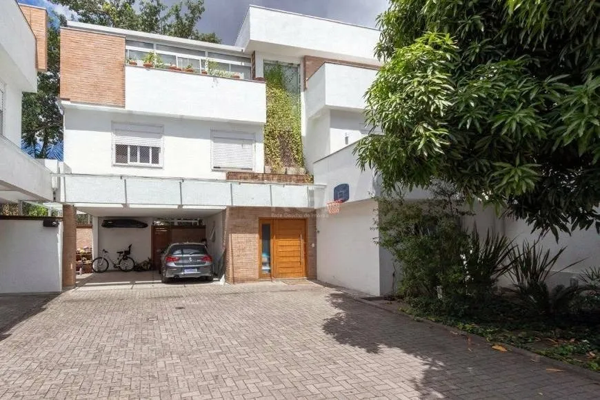 Foto 1 de Casa de Condomínio com 4 Quartos à venda, 283m² em Jardim Isabel, Porto Alegre