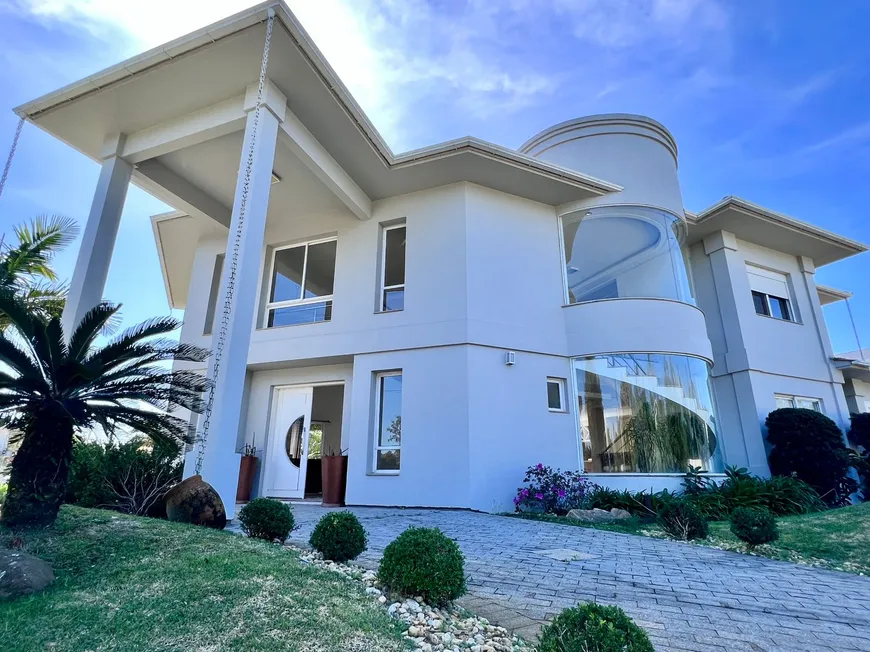Foto 1 de Casa de Condomínio com 4 Quartos para alugar, 390m² em Condominio Velas da Marina, Capão da Canoa