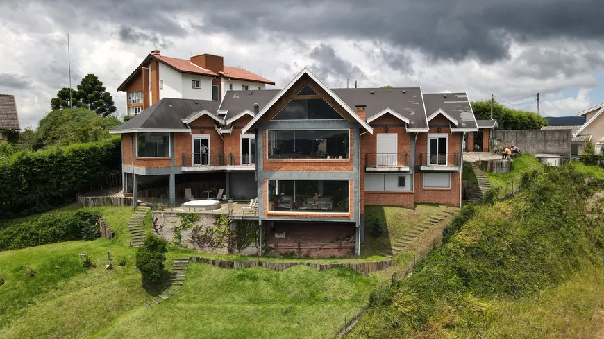 Foto 1 de Casa de Condomínio com 5 Quartos à venda, 420m² em Descansopolis, Campos do Jordão