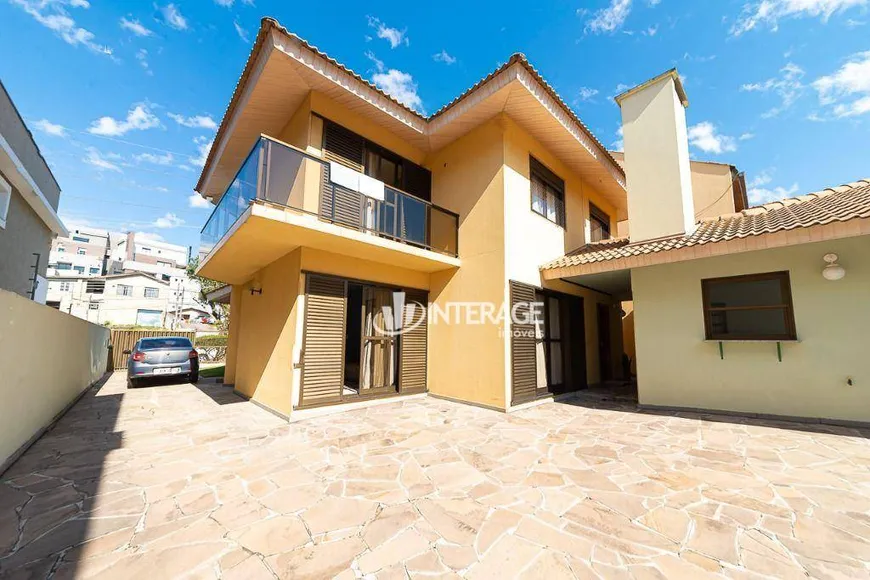 Foto 1 de Casa com 4 Quartos à venda, 252m² em Mercês, Curitiba