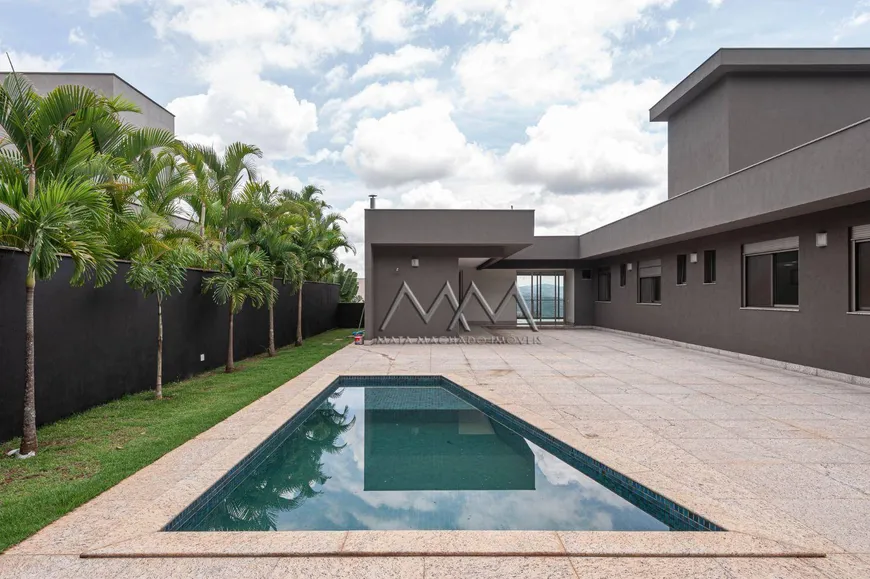 Foto 1 de Casa de Condomínio com 4 Quartos à venda, 372m² em Condominio Quintas do Sol, Nova Lima