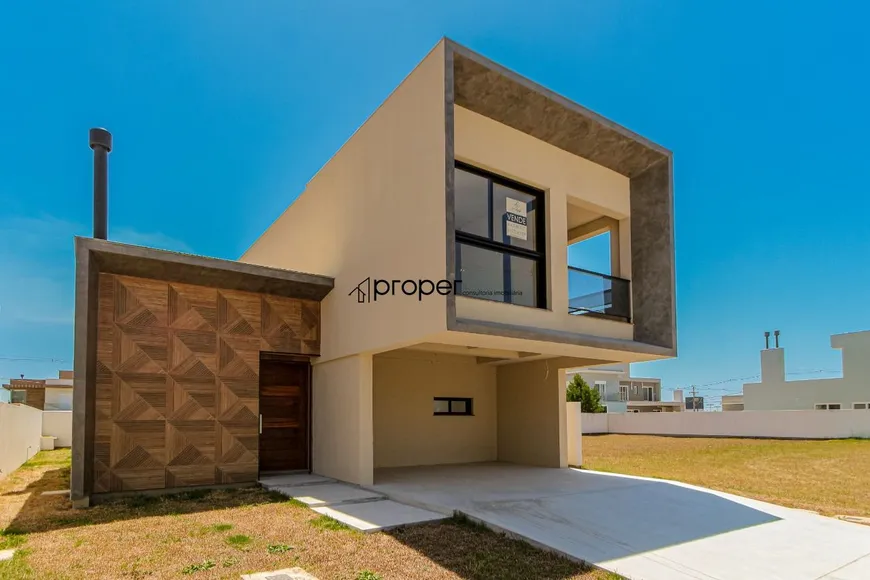 Foto 1 de Casa de Condomínio com 3 Quartos para venda ou aluguel, 230m² em Laranjal, Pelotas