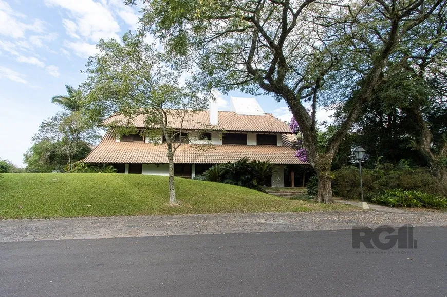 Foto 1 de Casa de Condomínio com 6 Quartos à venda, 701m² em Cavalhada, Porto Alegre