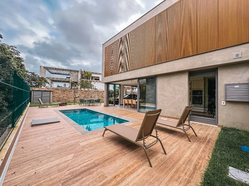 Foto 1 de Casa de Condomínio com 4 Quartos à venda, 465m² em Riviera de São Lourenço, Bertioga