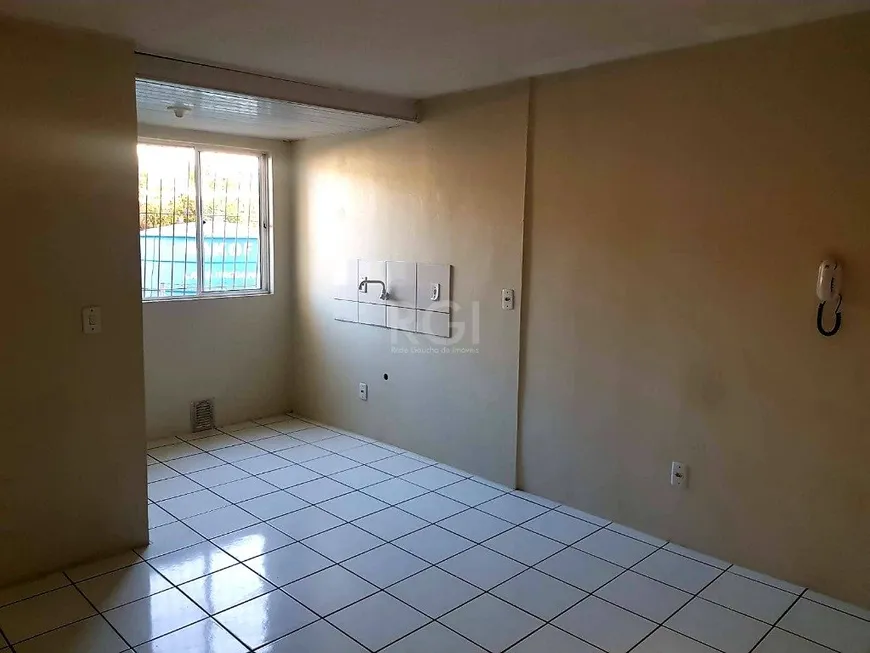 Foto 1 de Apartamento com 2 Quartos à venda, 43m² em Vila Nova, Porto Alegre