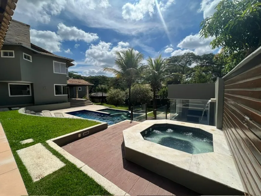 Foto 1 de Casa de Condomínio com 4 Quartos à venda, 650m² em Braúnas, Belo Horizonte