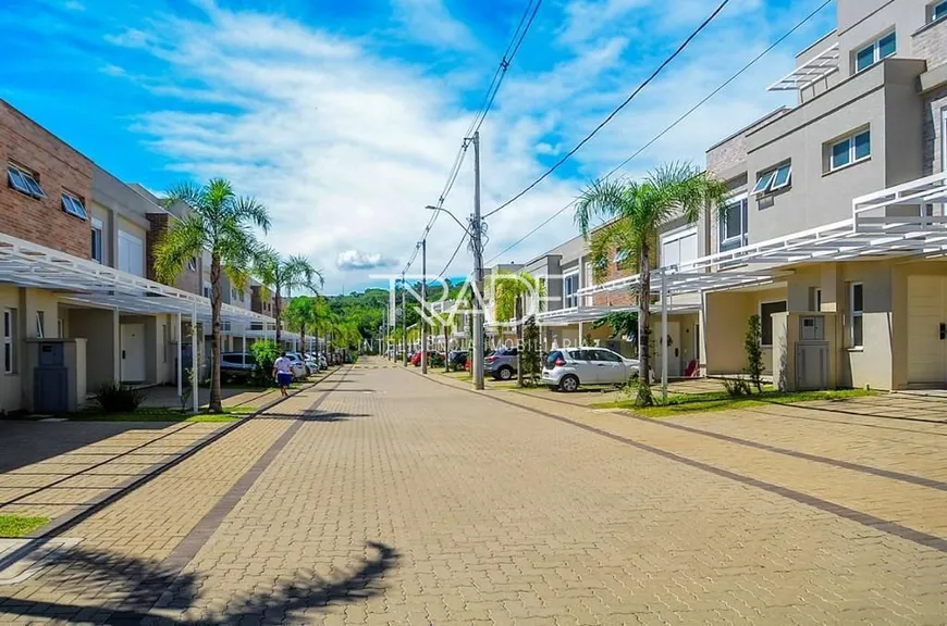 Foto 1 de Casa de Condomínio com 3 Quartos à venda, 120m² em Vila Nova, Porto Alegre